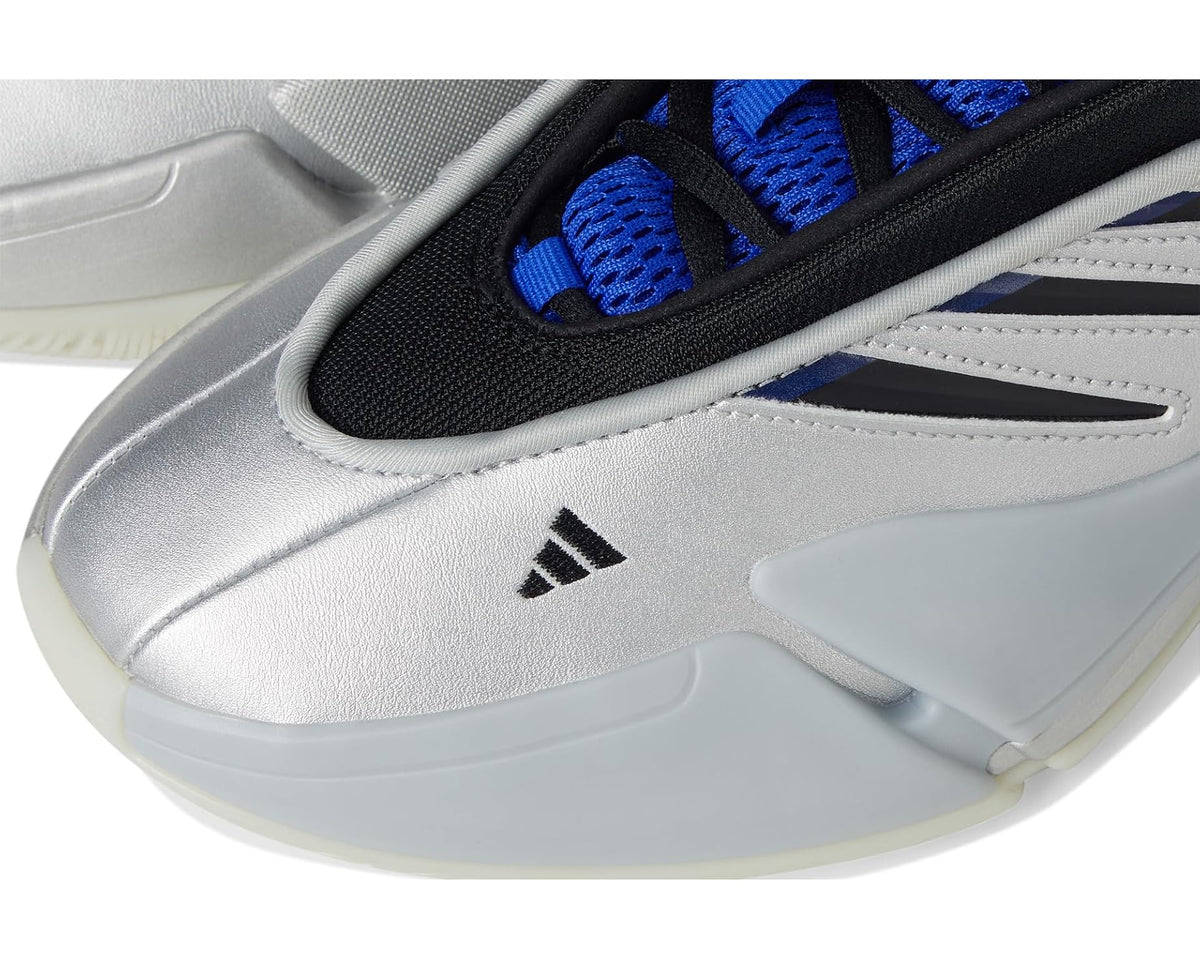 Close-up adidas Dame 9 side panel in silver metallic with black details and blue laces
