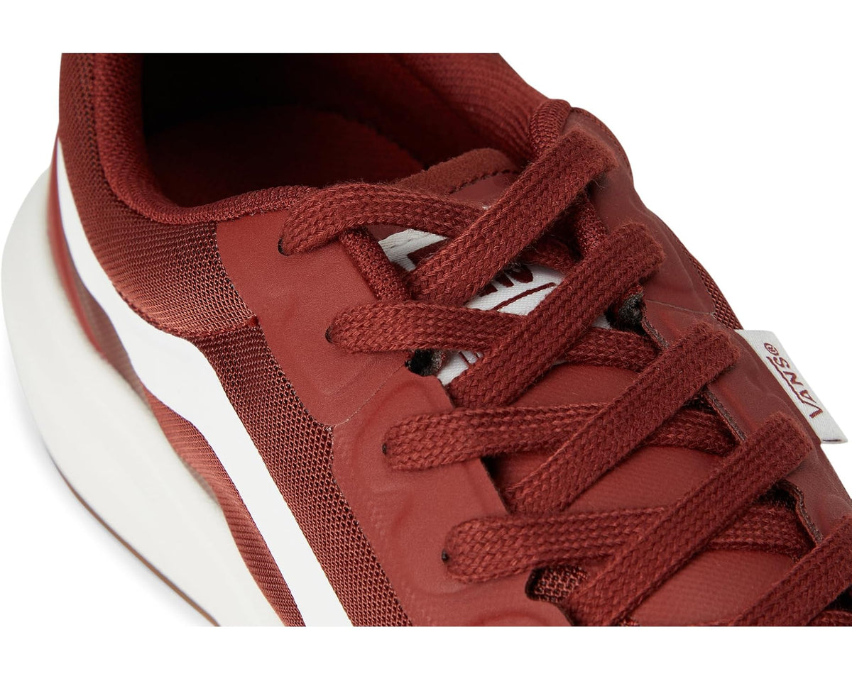 Bordeaux sneaker close-up showing mesh upper texture and red laces