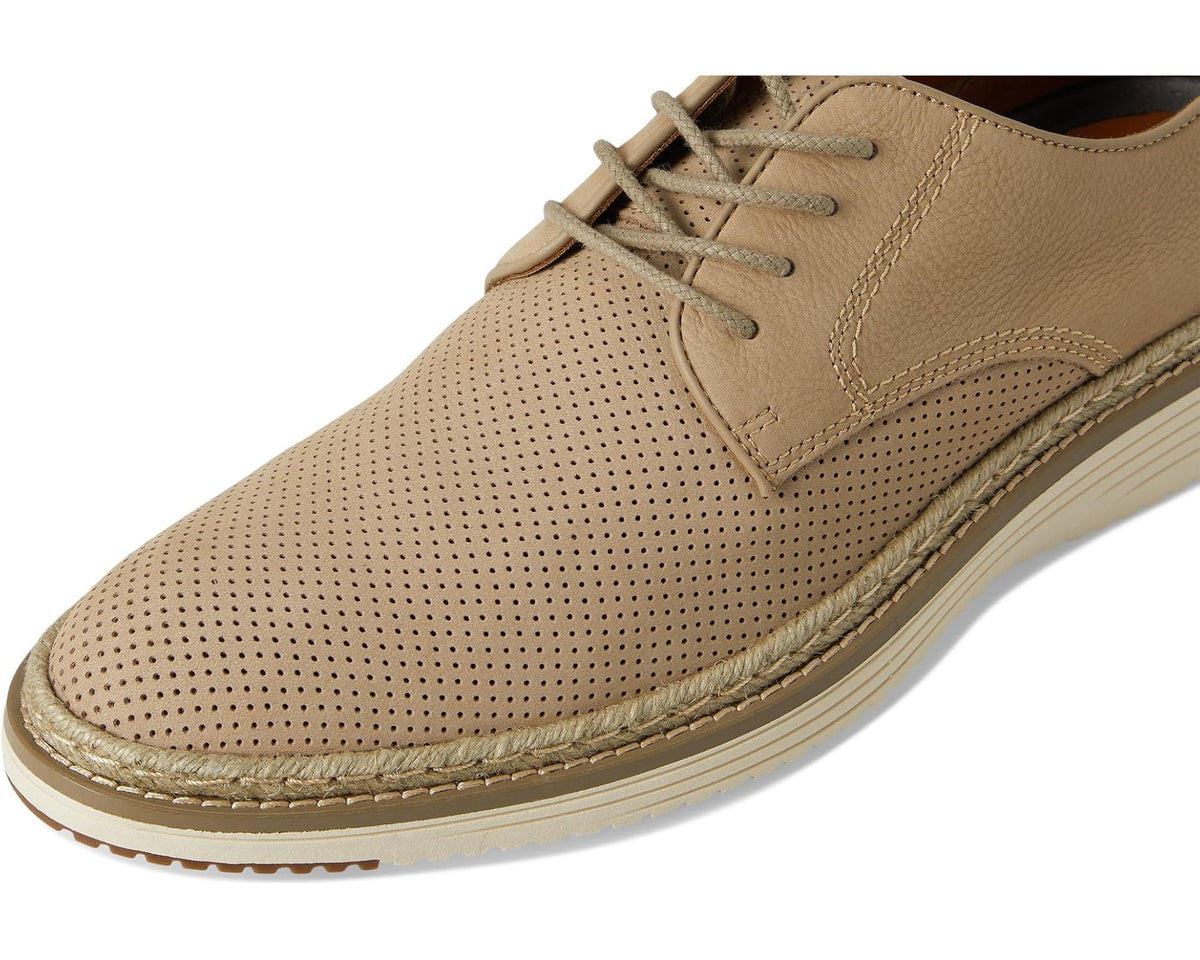 Men's Johnston & Murphy taupe perforated lace-up shoe close-up, panel seams