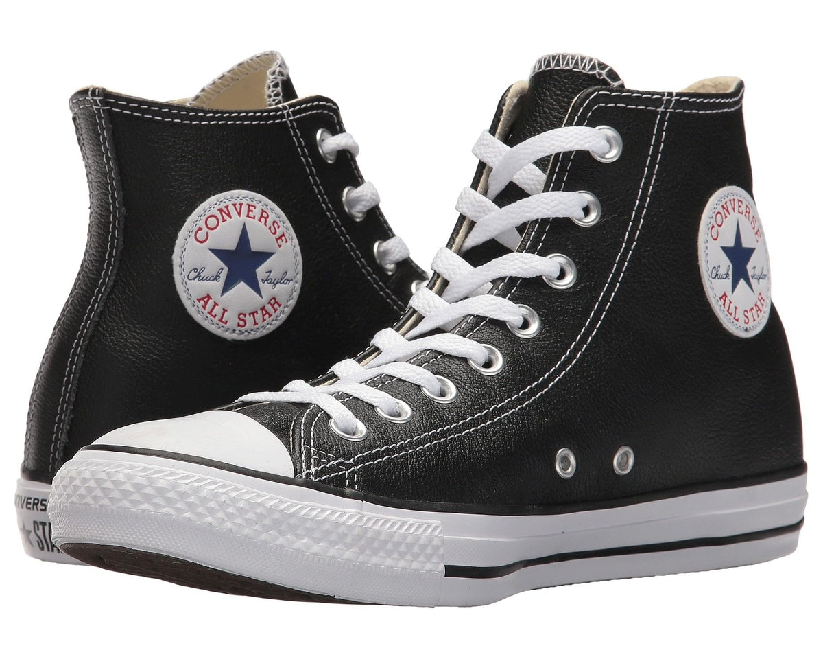 Black leather high-top sneakers with white laces and rubber toe cap