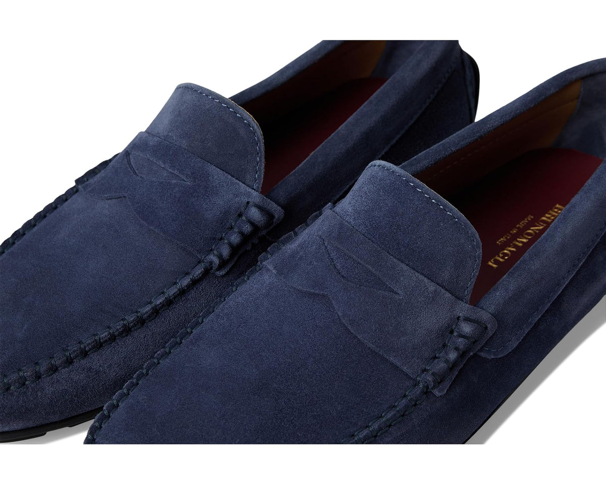 Blue suede men's loafer top view showing penny strap seams and red lining