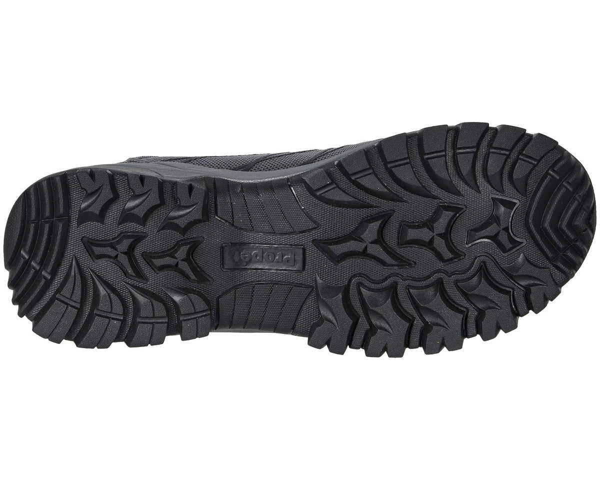 Men's outsole view of grey/black high-top hiking boots with rugged tread.