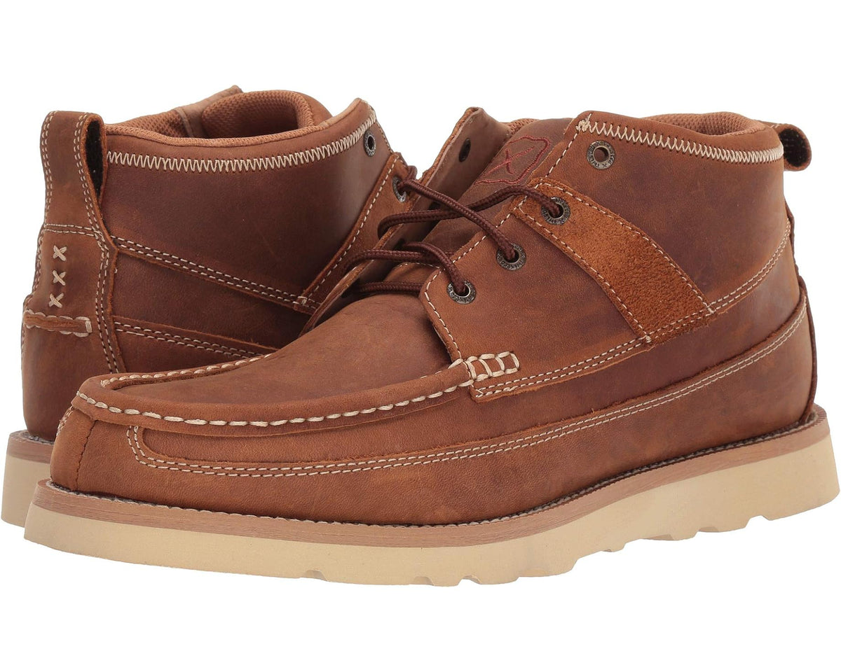 Brown leather lace-up boot with saddle paneling and stitched seams