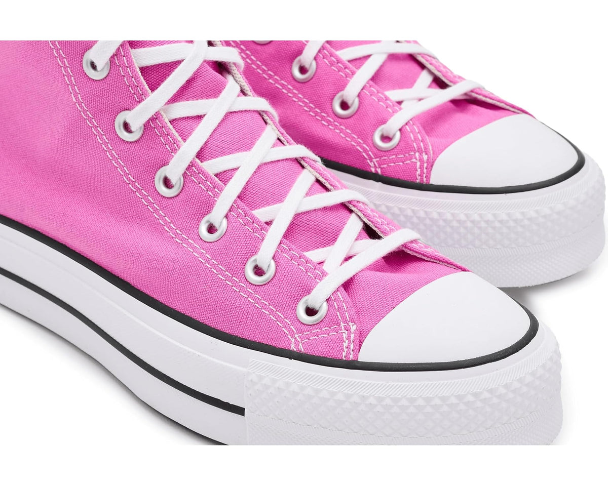 Women's Converse platform sneakers, close-up of shocking orchid laces and white rubber trim