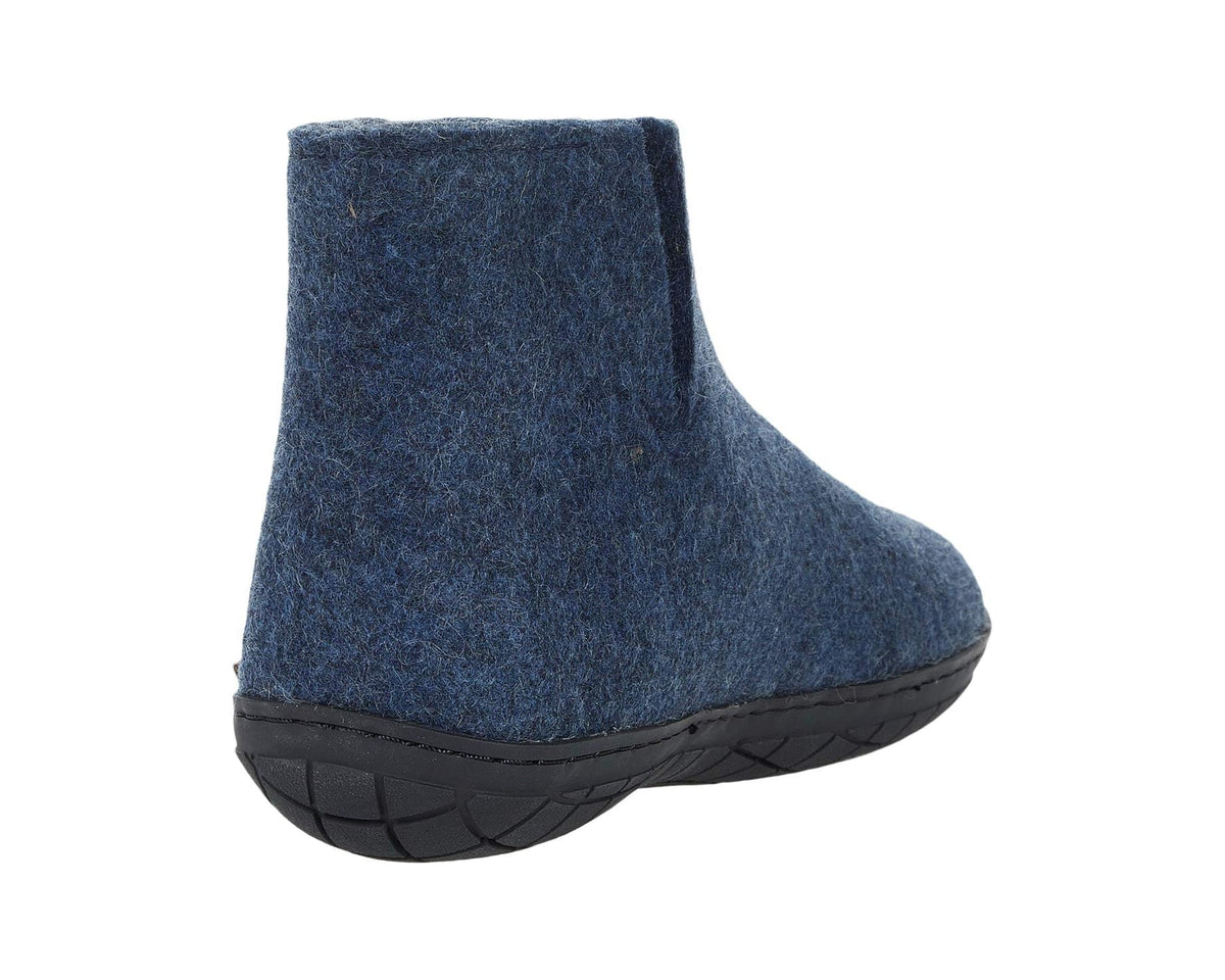 Denim-blue wool ankle boot with black rubber outsole, side view