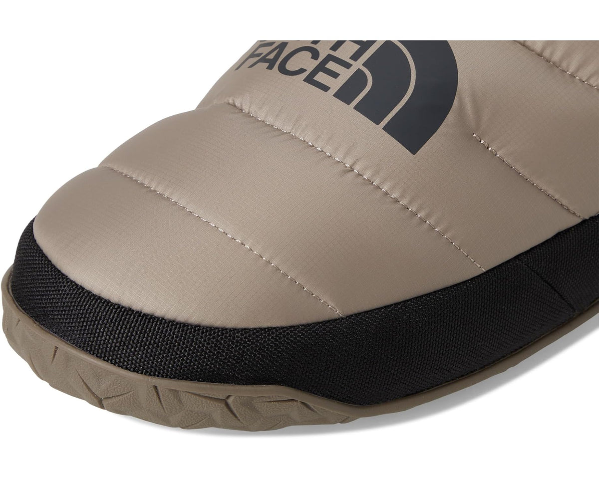 Men's The North Face Nuptse mule close-up of taupe quilted upper and logo panel