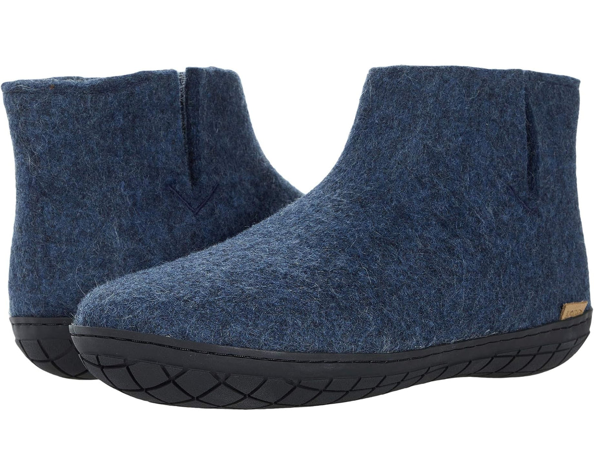Denim-blue wool Chelsea boot with black rubber outsole and molded tread