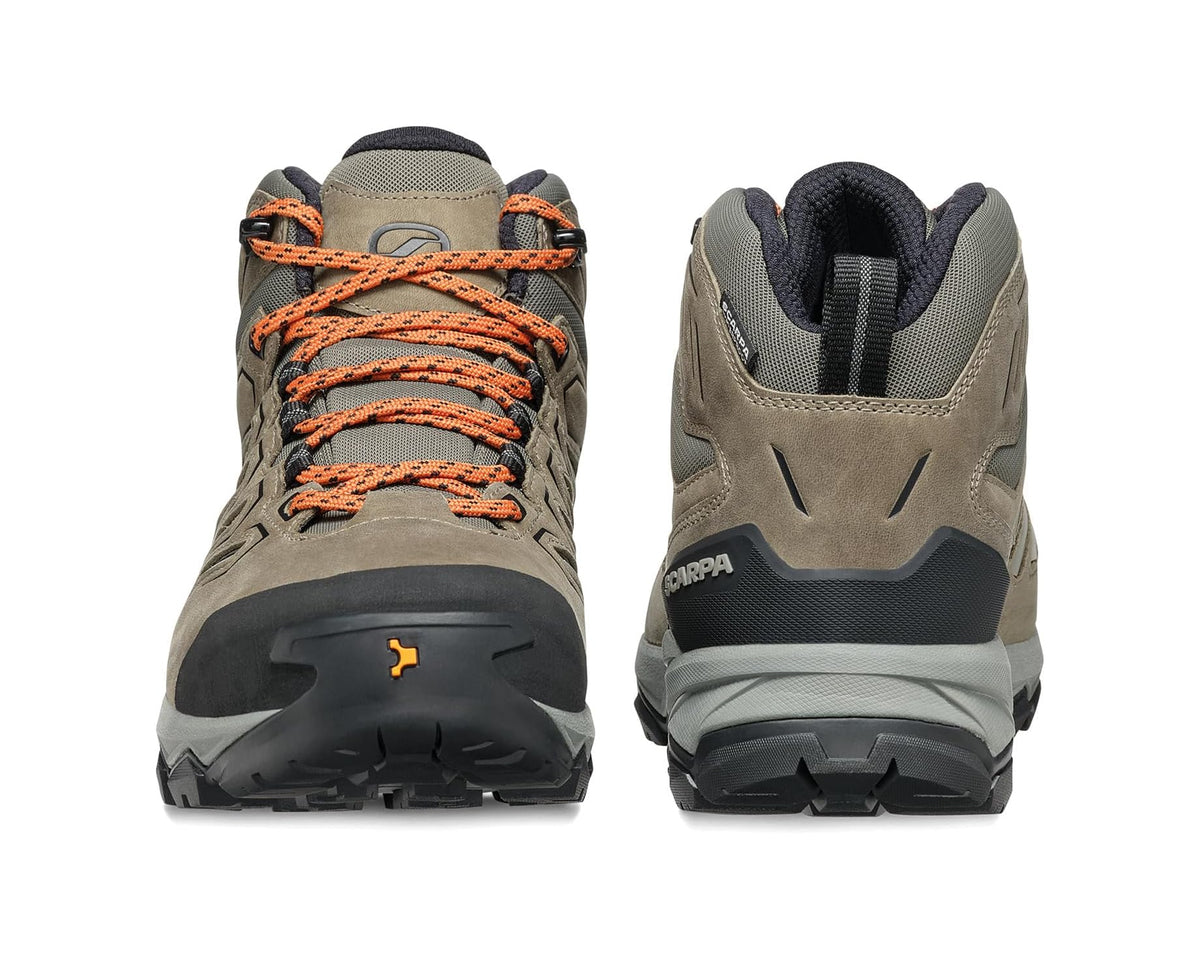Front and heel view of fossil brown mid hiking boots with orange laces and rubber sole
