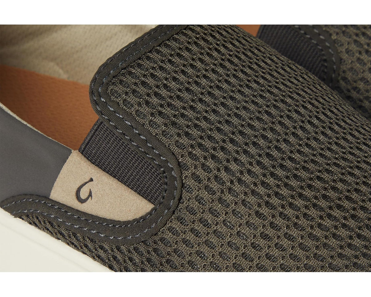 Close-up of OluKai slip-on sneaker upper showing dark brown mesh texture and stitching