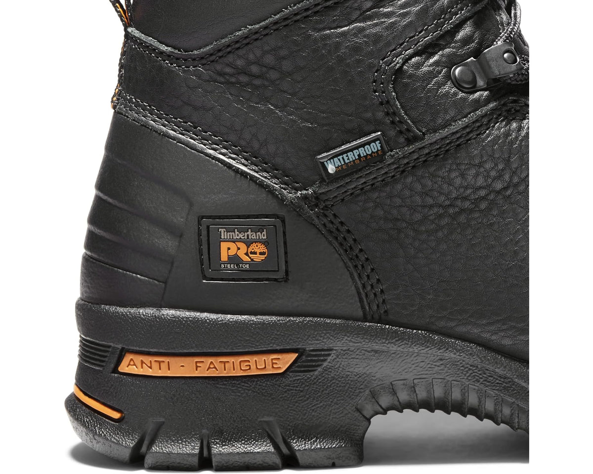 Close-up of black boot side panel with waterproof label and anti-fatigue strip