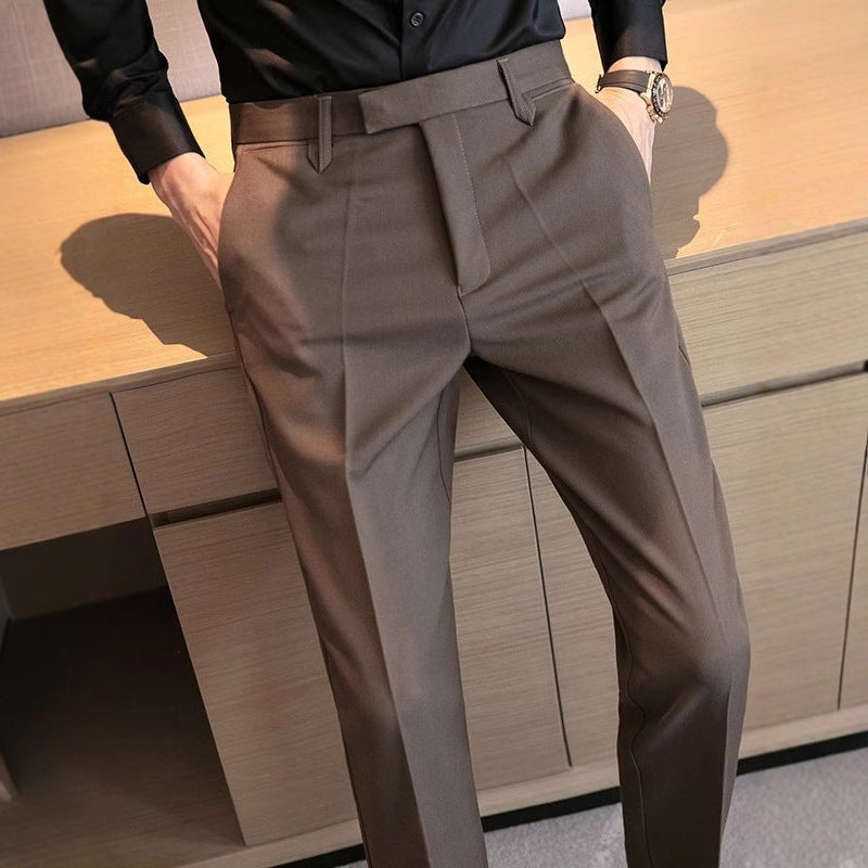 Men's dress pants in taupe gray, flat front, belt loops, and straight tapered fit