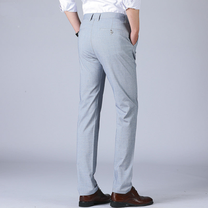 Men's thin dress pants in light blue, belt loops, button closure, straight leg