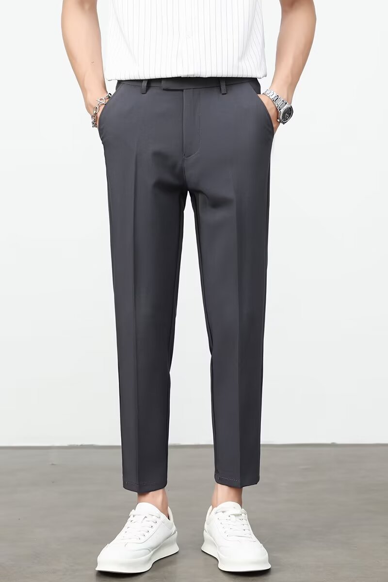Men's dress pants in dark charcoal, flat front with belt loops and ankle-length legs