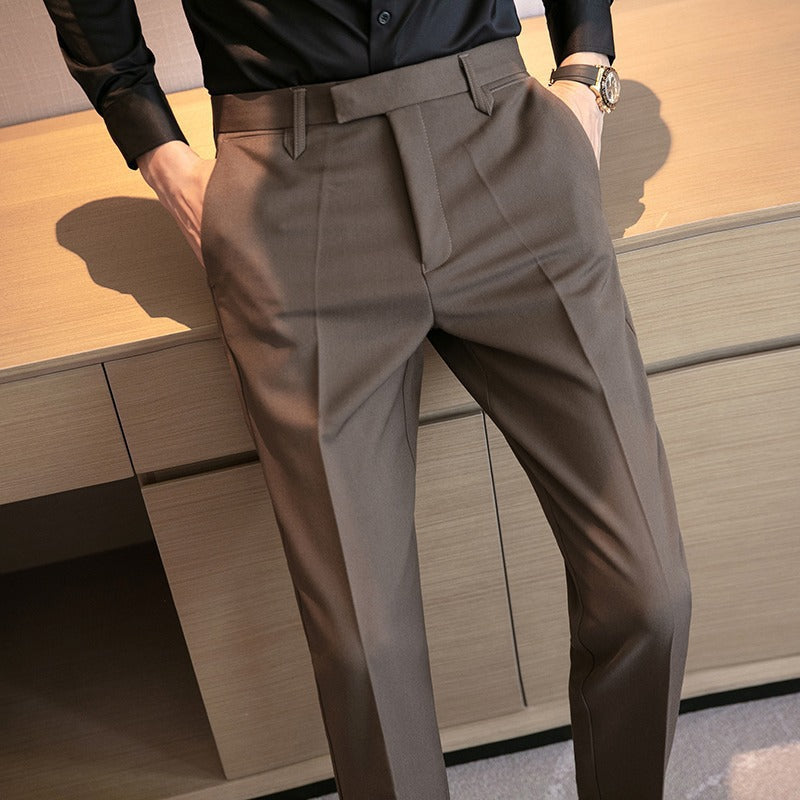 Men's dress pants in dark taupe gray, flat front with belt loops and slim fit
